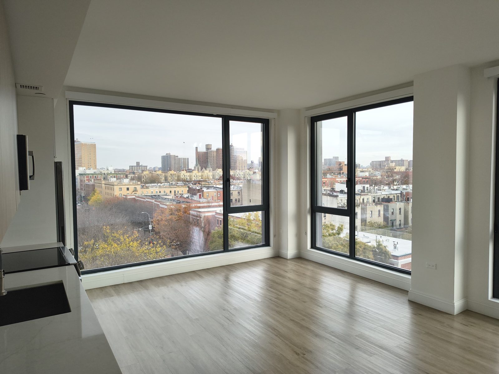Oversize energy-efficient glass panel with a tilt-and-turn operable sash in a Harlem apartment at 2535 Frederick Douglass Boulevard, Manhattan