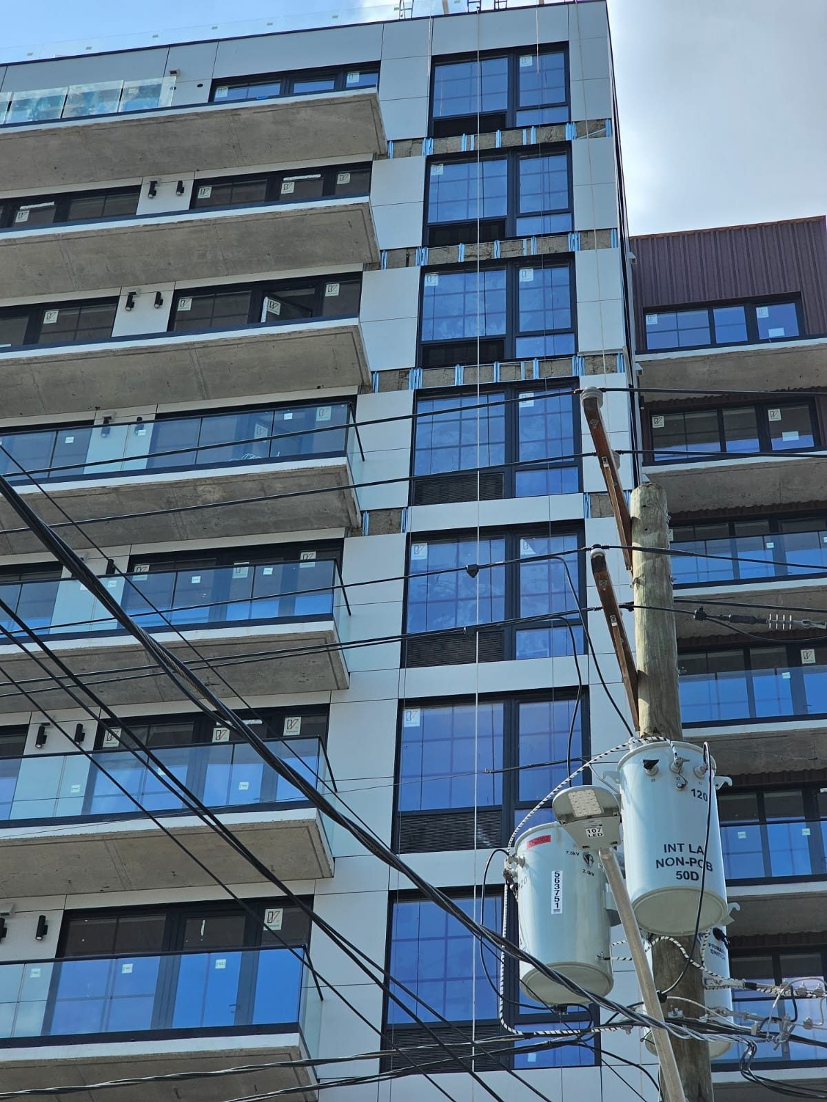 uPVC windows stacked on the upper floors of 66 McWhorter Street, Newark